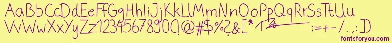 PhitradesignHandwrittenThin Font – Purple Fonts on Yellow Background