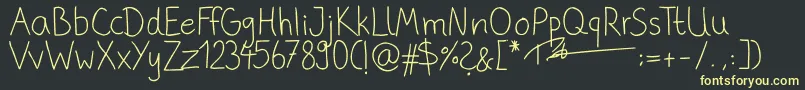 PhitradesignHandwrittenThin Font – Yellow Fonts on Black Background