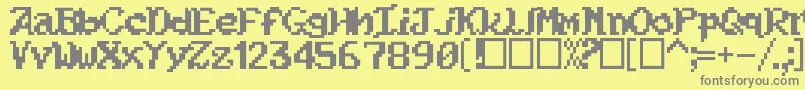 Kouryuu-fontti – harmaat kirjasimet keltaisella taustalla