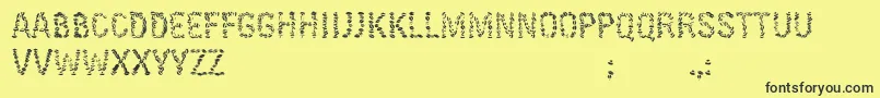 KissingfontV6-Schriftart – Schwarze Schriften auf gelbem Hintergrund