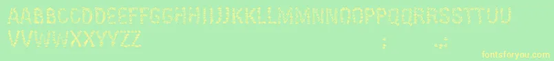 Więcej informacji o czcionce KissingfontV6 Czcionka KissingfontV6 – żółte czcionki na zielonym tle