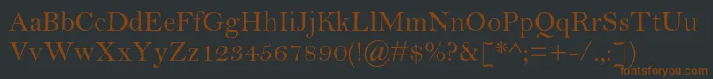 Шрифт BellmtstdRegular – коричневые шрифты на чёрном фоне