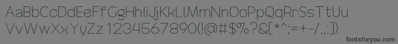 DrakoheartRevofitLight Font – Black Fonts on Gray Background