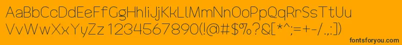 DrakoheartRevofitLight Font – Black Fonts on Orange Background