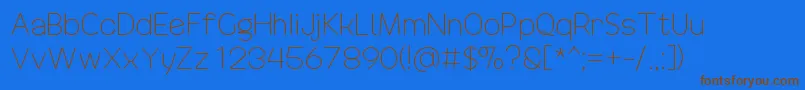 DrakoheartRevofitLight-Schriftart – Braune Schriften auf blauem Hintergrund