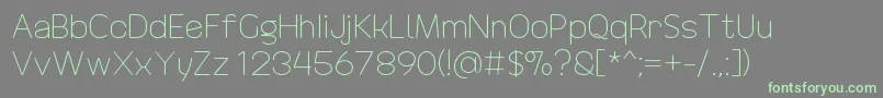 DrakoheartRevofitLight Font – Green Fonts on Gray Background