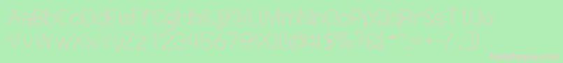 DrakoheartRevofitLight-fontti – vaaleanpunaiset fontit vihreällä taustalla