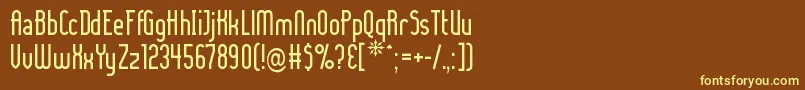 Ladyic-fontti – keltaiset fontit ruskealla taustalla