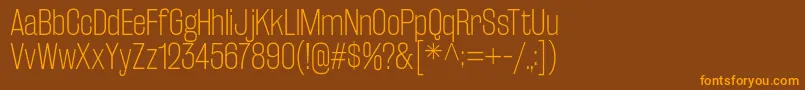 RakeslyEl Font – Orange Fonts on Brown Background
