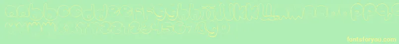 BubbleteaHollow-fontti – keltaiset fontit vihreällä taustalla