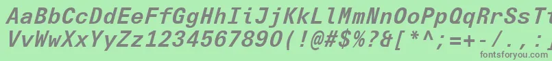 フォントUniversNextTypewriterProBoldItalic – 緑の背景に灰色の文字