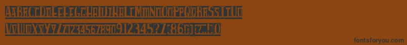 Spankys Bungalow Blanco-Schriftart – Schwarze Schriften auf braunem Hintergrund