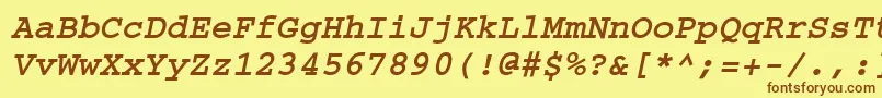 フォントCourier ffy – 茶色の文字が黄色の背景にあります。