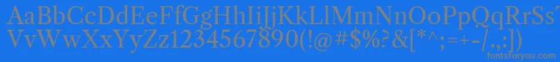 フォントLibrecaslontextRegular – 青い背景に灰色の文字