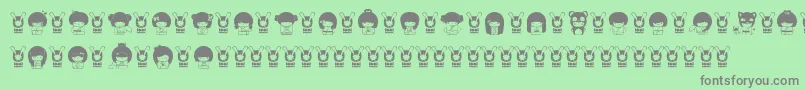 フォントKokeshiKawaii – 緑の背景に灰色の文字