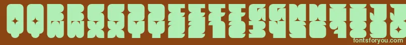 Muchbolder Font – Green Fonts on Brown Background