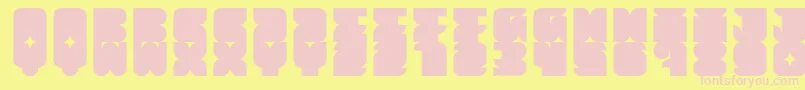Czcionka Muchbolder – różowe czcionki na żółtym tle