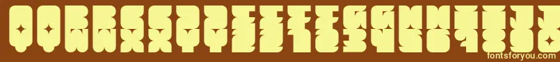 Muchbolder-fontti – keltaiset fontit ruskealla taustalla