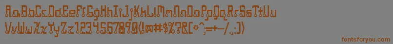 フォントQuasidipitous – 茶色の文字が灰色の背景にあります。