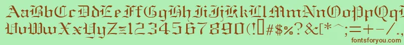 フォントOldenglish – 緑の背景に茶色のフォント