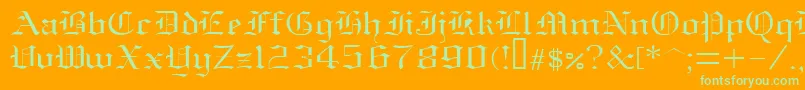 Oldenglish-Schriftart – Grüne Schriften auf orangefarbenem Hintergrund