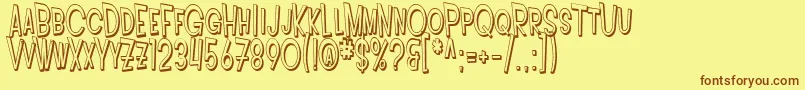 Fonte SfIntoxicatedBluesShaded – fontes marrons em um fundo amarelo