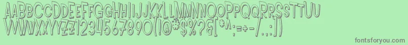 SfIntoxicatedBluesShaded Font – Gray Fonts on Green Background