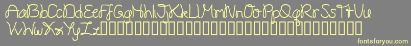 Onestroke Font – Yellow Fonts on Gray Background