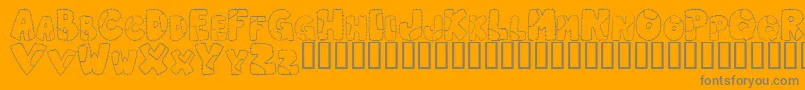 Patcl-Schriftart – Graue Schriften auf orangefarbenem Hintergrund