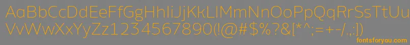 AminoAltExtralight-Schriftart – Orangefarbene Schriften auf grauem Hintergrund