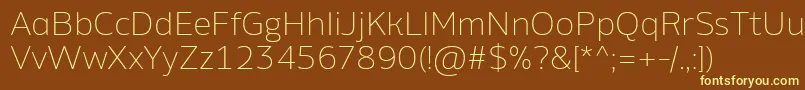 AminoAltExtralight Font – Yellow Fonts on Brown Background