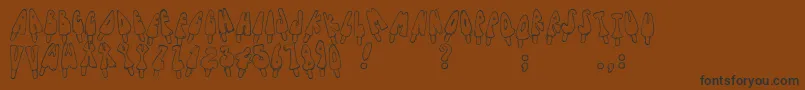 Jennas Popsicles Font – Black Fonts on Brown Background