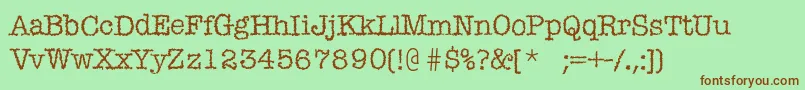Mistica Font – Brown Fonts on Green Background