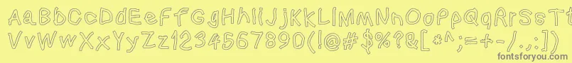 Squaredhandol-Schriftart – Graue Schriften auf gelbem Hintergrund