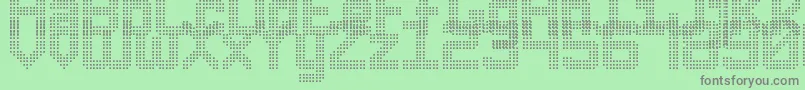 フォントTripleDotDigital7 – 緑の背景に灰色の文字
