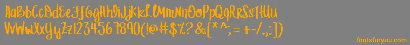 MrfLetFreedomRing Font – Orange Fonts on Gray Background