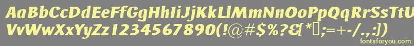 Czcionka AdHocBisItalic – żółte czcionki na szarym tle