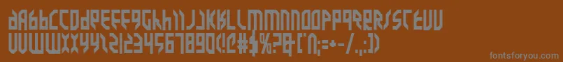 ValkyrieBold-fontti – harmaat kirjasimet ruskealla taustalla