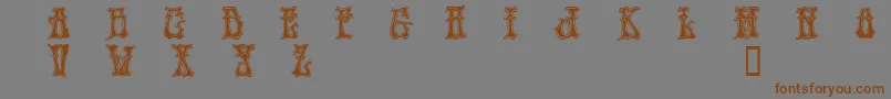 フォントHendd – 茶色の文字が灰色の背景にあります。