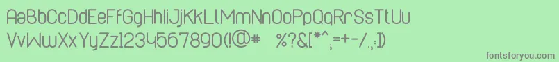 CaboRoundedRegular-fontti – harmaat kirjasimet vihreällä taustalla