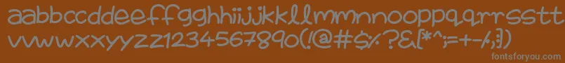 FairiesAreReal-fontti – harmaat kirjasimet ruskealla taustalla