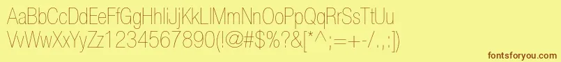 Шрифт HelveticaneueltstdUltltcn – коричневые шрифты на жёлтом фоне