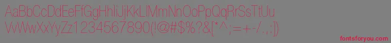 HelveticaneueltstdUltltcn Font – Red Fonts on Gray Background