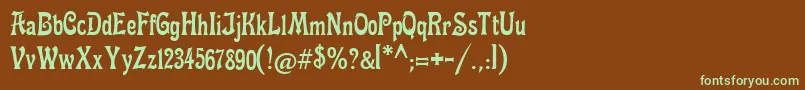 フォントFettemikado – 緑色の文字が茶色の背景にあります。