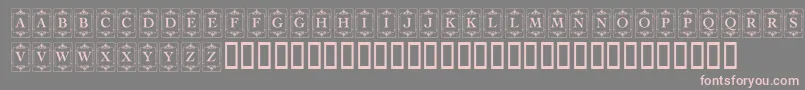 KrDecoCapsOne-fontti – vaaleanpunaiset fontit harmaalla taustalla
