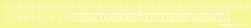 KrDecoCapsOne-fontti – valkoiset fontit keltaisella taustalla