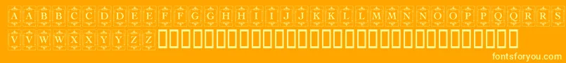 KrDecoCapsOne-fontti – keltaiset fontit oranssilla taustalla