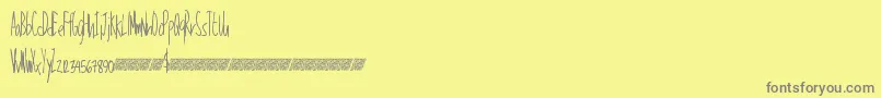 Talkinglouder-Schriftart – Graue Schriften auf gelbem Hintergrund