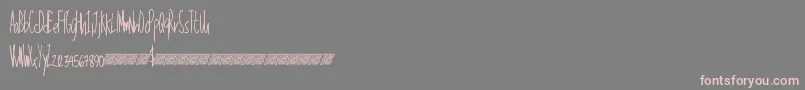 Talkinglouder-Schriftart – Rosa Schriften auf grauem Hintergrund