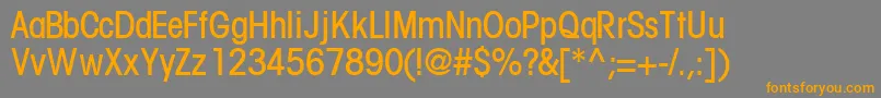 フォントTrendexlightcondsskRegular – オレンジの文字は灰色の背景にあります。